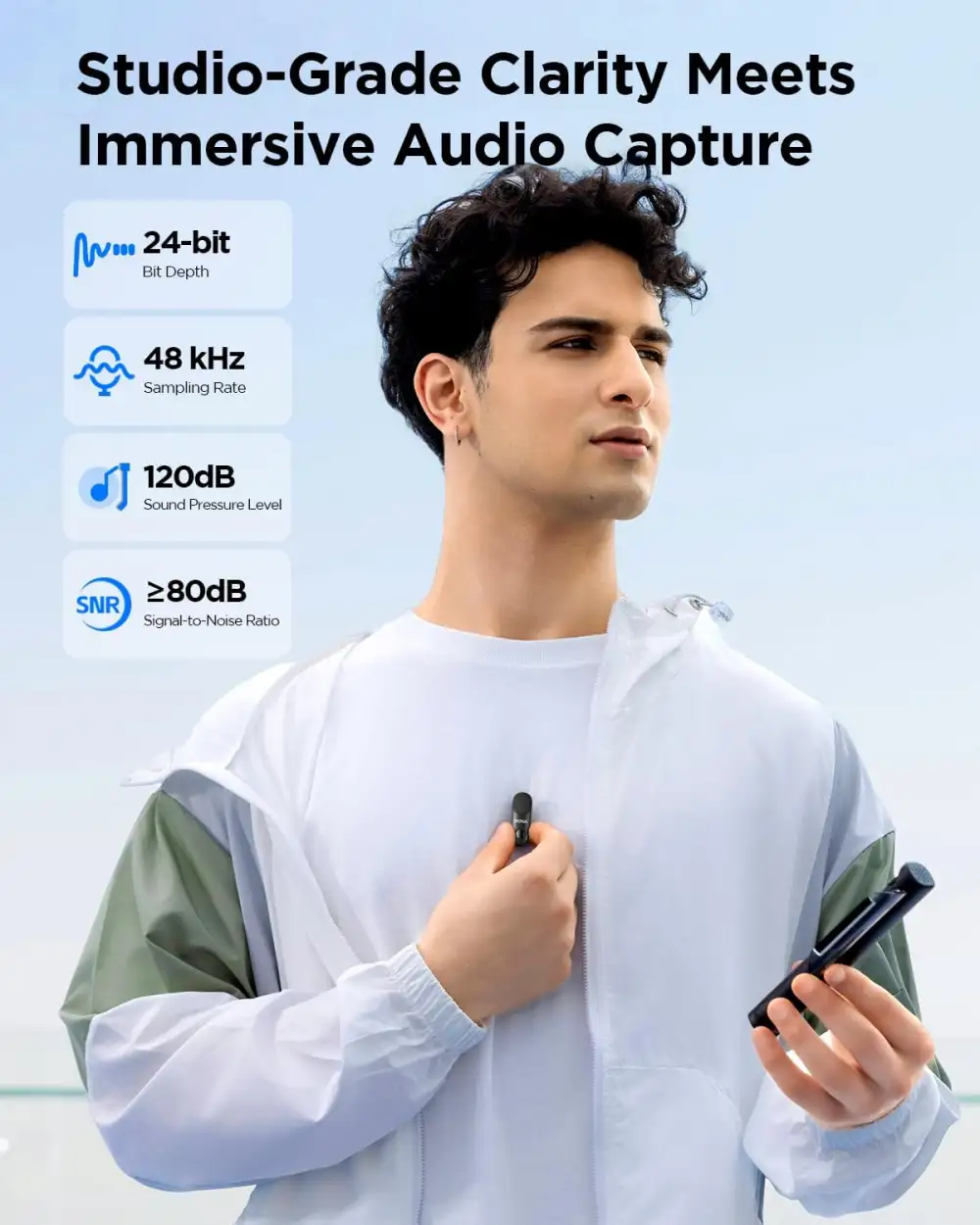 A lifestyle image showing the microphone clipped to a smartphone during a video shoot,