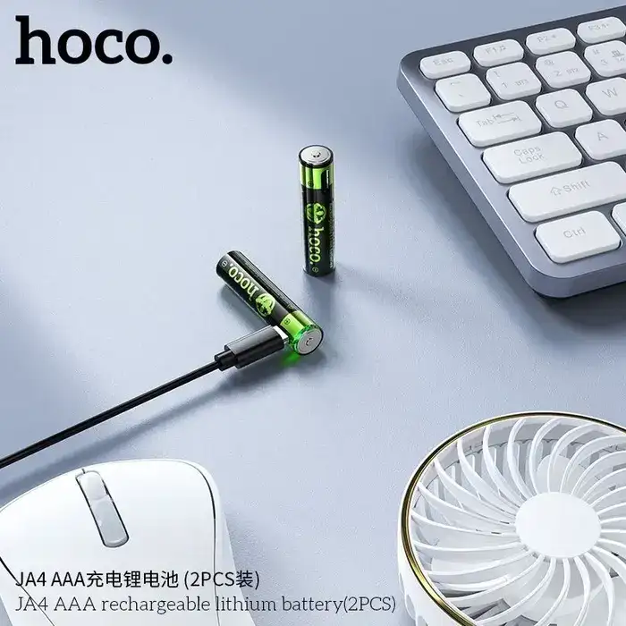 A flat-lay image showing the JA4 batteries beside a charger,