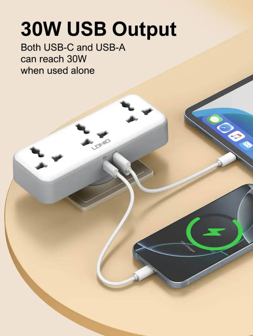A lifestyle image showing the SC3317 placed on a desk powering a laptop, charger