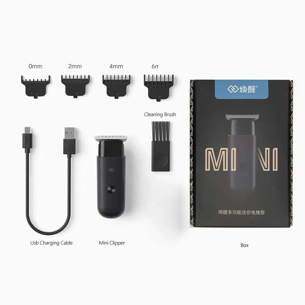 Xiaomi Huanxing EC101 cordless hair clipper with included accessories and USB cable
