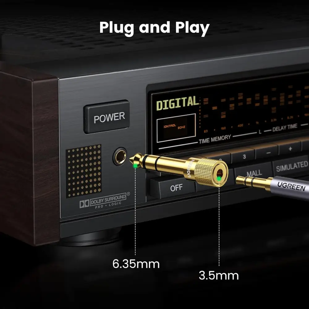 UGREEN 20503 6.35mm male to 3.5mm female audio adapter connected to an amplifier for plug and play audio compatibility